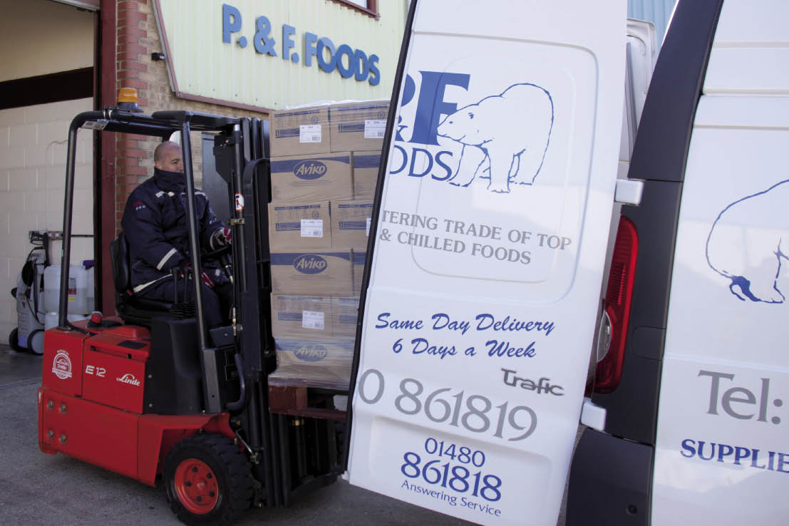 Loading frozen foods into a van by forklift